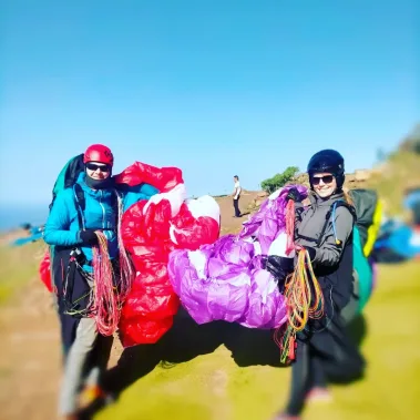 paragliding couple holiday